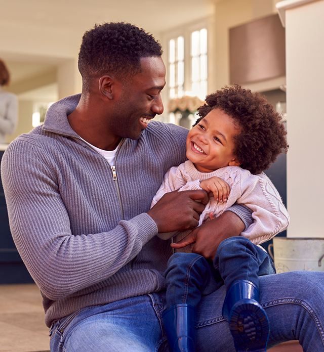 Image of an African American with his son