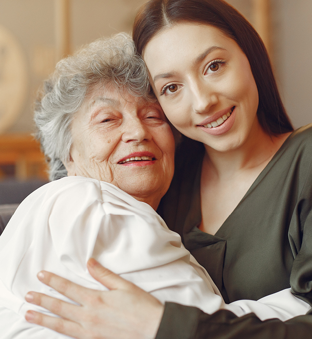 Grandmother hugging grandchild