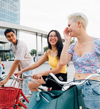 People happy riding bicycle