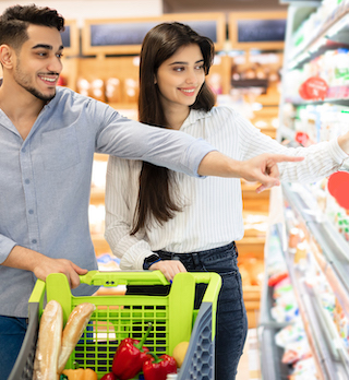 Couple Shopping Together and Smiling