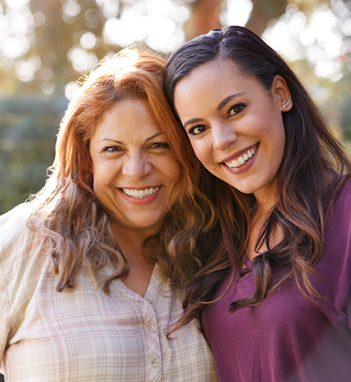 Two women smiling